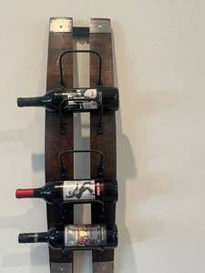 lot 56 image: Wooden Wall-Mount Wine Rack - 4 Bottle Capacity, Dark Stain with Metal Cradles - wine NOT included