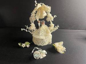 lot 72 image: Vintage Bride & Groom Wedding Cake Topper on Lace Arch with Bell