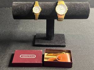 lot 78 image: Timex Indiglo Quartz Gold Tone Watches (Lot of 2) & Nail Clipper w Leather Pouch