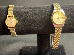 lot 82 image: Two Vintage Quartz Watches - Tissot Dress Watch & Pulsar Day-Date
