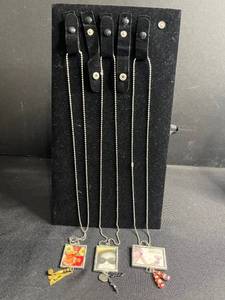 lot 117 image: Three Glass Art Hand Made Framed Photo Necklaces - Assorted Prints