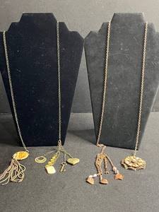 lot 122 image: Gold-Tone Layered Lariat Charm Necklaces With Shell & Heart Pendants (Lot of 2)