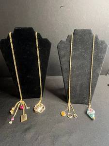lot 124 image: Gold-Tone Lariat Charm Necklaces (Lot of 2)