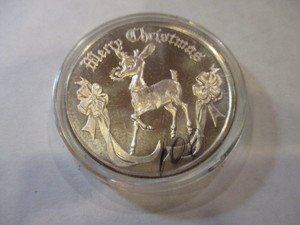 lot 62 image: 2005 MERRY CHRISTMAS SILVER DOLLAR