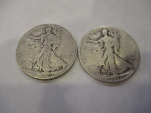 lot 103 image: 1929 & 1920 WALKING LIBERTY HALF DOLLARS