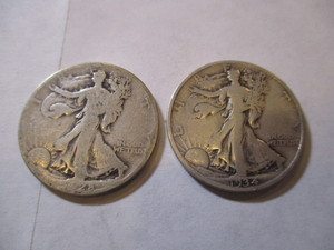 lot 110 image: 1928 & 1934 WALKING LIBERTY HALF DOLLARS
