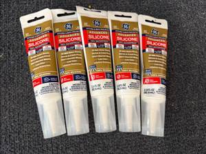 lot 64 image: 6 Tubes Of Ge White Silicone