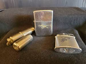 lot 43 image: 3 Very Collectable Vintage Lighters 1978 Zippo RoadRunner, Flare Tube Lighter, And Ronson Princess