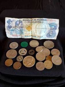 lot 44 image: Nice Lot of Coins and Tokens including A Kennedy 64 Half Dollar, Mpls and St Paul Railroad Token and Phillipino Money