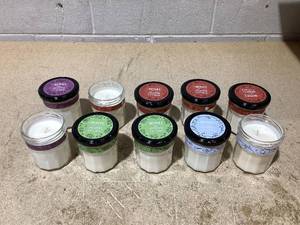 lot 153 image: LOT OF 10 Mrs. Meyers Clean Day Soy Candles (Snowdrop, Elderberry, Gingerbread & Iowa Pine Scents)