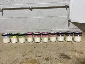 lot 265 image: LOT OF 10 Mrs. Meyers Clean Day Soy Candles (Iowa Pine, Snowdrop, Elderberry & Peppermint Scent)