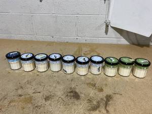 lot 268 image: LOT OF 10 Mrs. Meyers Clean Day Soy Candles (Iowa Pine, Snowdrop, & Rain Water Scent)