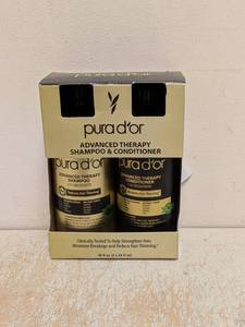 lot 215 image: NEW PURA DOR ADVANCED THERAPY SHAMPOO & CONDITIONER