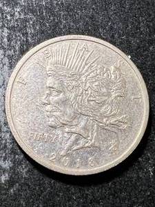 lot 23 image: 1 TROY OZ .999 FINE SILVER ZOMBUCKS ROUND