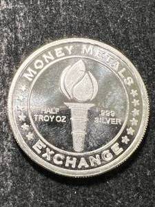 lot 61 image: HALF TROY OZ .999 FINE SILVER MONEY METALS EXCHANGE ROUND