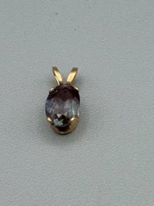 lot 218 image: 14K Gold Pendant with Oval Purple Gemstone