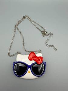 lot 221 image: Sanrio Hello Kitty Sunglasses Pendant Necklace