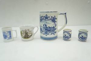 lot 21 image: Vintage Collectible Delft Blue Holland Heineken Ceramic Stein and shot glasses