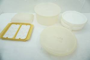 lot 73 image: Tupperware Pie & Cake Carriers wstackable plates, Rectangular Deviled Egg Container