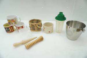 lot 85 image: Stainless Bucket, MixingMeasuring Cup wpour lid, stoneware bowl, Soup Mugs, wooden tapered dowel, wooden ribbed roller