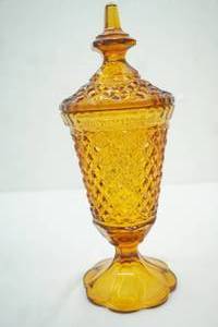 lot 134 image: Vintage Indiana Glass amber diamond point pedestal apothecary jar wlid. 12 tall