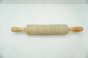 lot 234 image: ribbed wooden rolling pin