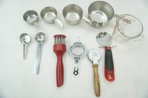 lot 249 image: Kitchen Utensils and Measuring Cups