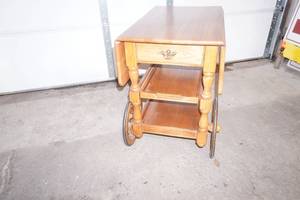 lot 379 image: Vintage wooden tea cart or beverage trolley wdrop-leaf sides