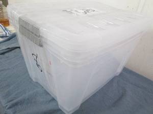 lot 41 image: 2 Medium plastic storage totes...