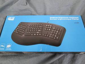 lot 70 image: Ergonomic USB Keyboard...