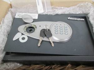 lot 126 image: Sentry Safe. Needs knob attached...
