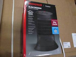 lot 147 image: Honeywell ceramic heater...