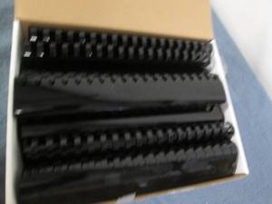 lot 184 image: 50 2 binder combs...