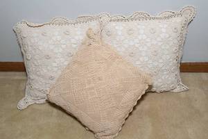 lot 53 image: Set of Three Crocheted Throw Pillows
