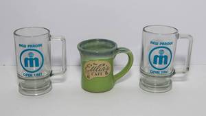 lot 93 image: Set of 3 New Prague, MN Mugs  Ettlins Cafe  2 Local Business Mugs