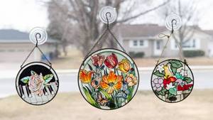 lot 97 image: Three Glass Window Hangings