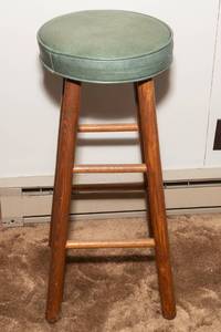 lot 229 image: Wooden Barstool with Green Faux Leather Seat