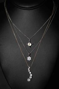 lot 130 image: Set of Three Rhinestone Necklaces - One 925 Sterling Silver