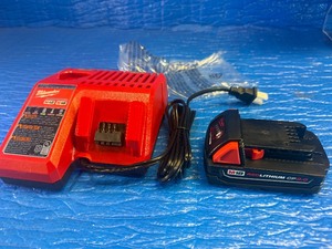 New - Milwaukee M18 REDLITHIUM CP2.0 Battery pack and a compatible multi-voltage charger