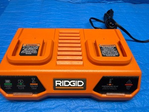 New - RIDGID 18V Dual Port Simultaneous Charger, model AC86095.