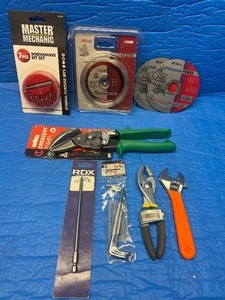 New - tool lot. Driver bits, offset screwdrivers , snips , cut off wheels, pliers and more