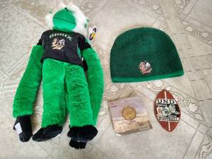 Fighting Sioux Lot - Monkey, Sealed REA Medal, Beanie, Etc