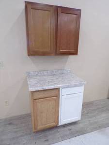 lot 7 image: 2 Base cabinet with Countertop and 2 Upper Cabinet