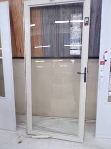 lot 54 image: 36 Cream Color Solid Glass Door