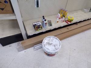 lot 221 image: Cordless Tool Cleaner, 2 box Vinyl End Cap, Irwin Strait Line, Cordless Finish Fuel, Caution Tape, Bucket of Panel Adhesive