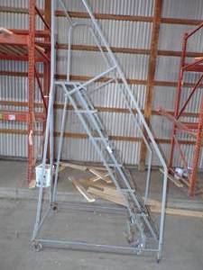 lot 313 image: Gray Rolling Ladder Steel
