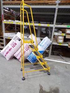 lot 340 image: Yellow Steel Rolling Ladder