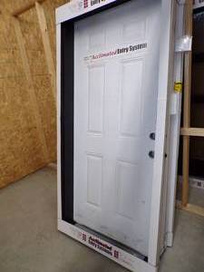 lot 371 image: White Exterior Door with Brown Jam 36