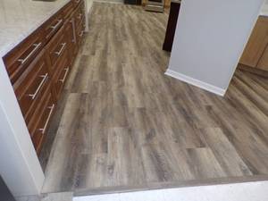 lot 245 image: EJ Welsh  loose lay vinyl flooring on Saleroom Floor