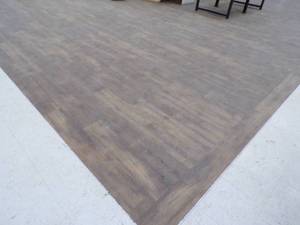lot 462 image: Rum River loose lay vinyl flooring on Salesroom floor